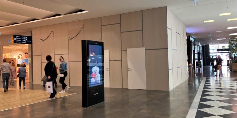 Im Einkaufszentrum Palais Vest hinter dem Haupteingang sieht man eine graue Wand, hinter der die Pandora-Filiale beheimatet ist.