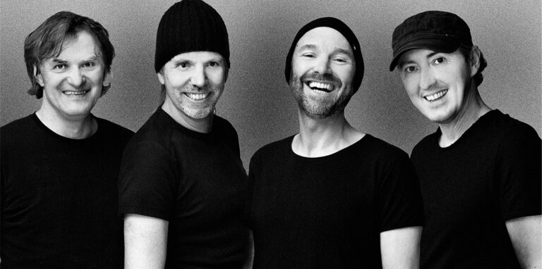 Die vier Mitglieder von „Goldplay-Live“ auf einem Bandfoto.