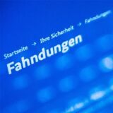 PC-Monitor auf dem das Wort Fahndung zu sehen ist.