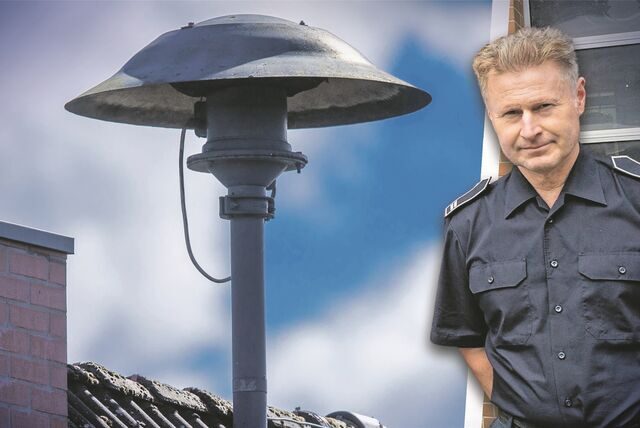 Kombo aus einer Sirene und dem Feuerwehrmann Andreas Pust