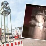Die zerstörte Persil-Uhr auf dem Neumarkt in Datteln. Darüber ein Standbild aus einem Video aus der Tatnacht.