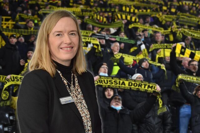 Nicole Langenberg-Sohn vom Hotel Radisson Blu vor BVB-Fans