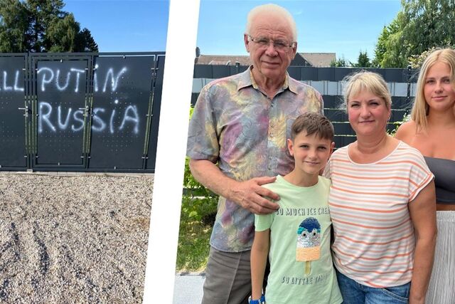 Ein Graffiti mit den Worten „Kill Putin – Fuck Russia“ an einem Gartentor und die besorgte Familie Spolwind.