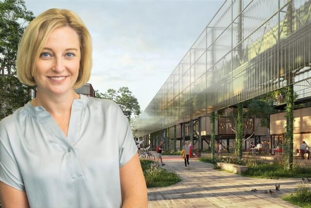 Dortmunds Wirtschaftsförderin Heike Marzen vor der Visualisierung der neuen Speicherstraße am Hafen