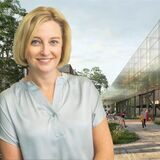 Dortmunds Wirtschaftsförderin Heike Marzen vor der Visualisierung der neuen Speicherstraße am Hafen