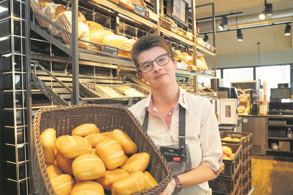 Frau mit Brötchen Frau mit Brötchen