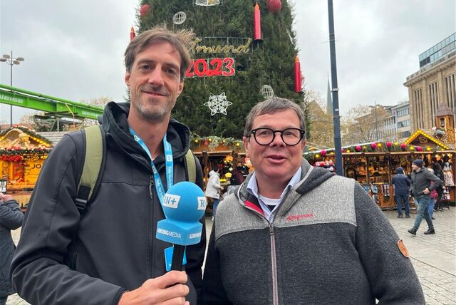 Der Dortmunder Weihnachtsmarkt ist eröffnet – RN-Reporter Rim Schulze (l.) und Schausteller-Sprecher Patrick Arens zeigen im Video-Rundgang, wie er dieses Jahr aussieht.