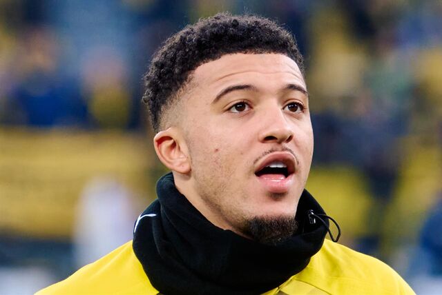 Jadon Sancho blickt mit offenem Mund geradeaus.