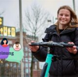 Zu sehen ist eine Frau, die auf einer Straße vor dem Dortmunder U auf einem E-Trettroller fährt.
(Archiv)