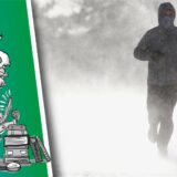 Ein Mann joggt durch eisigen Wind.