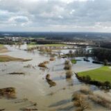 Montage zeigt Hochwasser in Datteln und das Icon der NINA-Warn-App