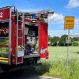 Feuerwehrwagen am Ortsschild Lavesum