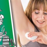 Frau benutzt ein Deodorant.