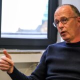 Dr. Karsten Kollecker sitzt in einem Raum in Recklinghausen.