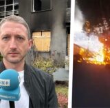Philipp Pohl steht vor einem Haus in Dortmund.
