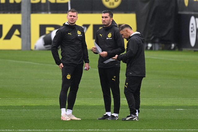 Nuri Sahin steht neben Lukasz Piszczek.