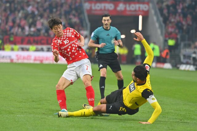 Emre Can setzt zur Grätsche an.