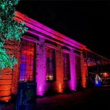 Die beleuchtete Orangerie im Schlosspark Herten.