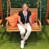 Melanie Appel ist Trainerin von Kindern und Jugendlichen bei den Roten Funken. Sie ist hier lächelnd abgebildet.