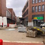 Blick in die neue Einkaufsgasse zwischen den Gebäudeblöcken der Hertener Höfe.