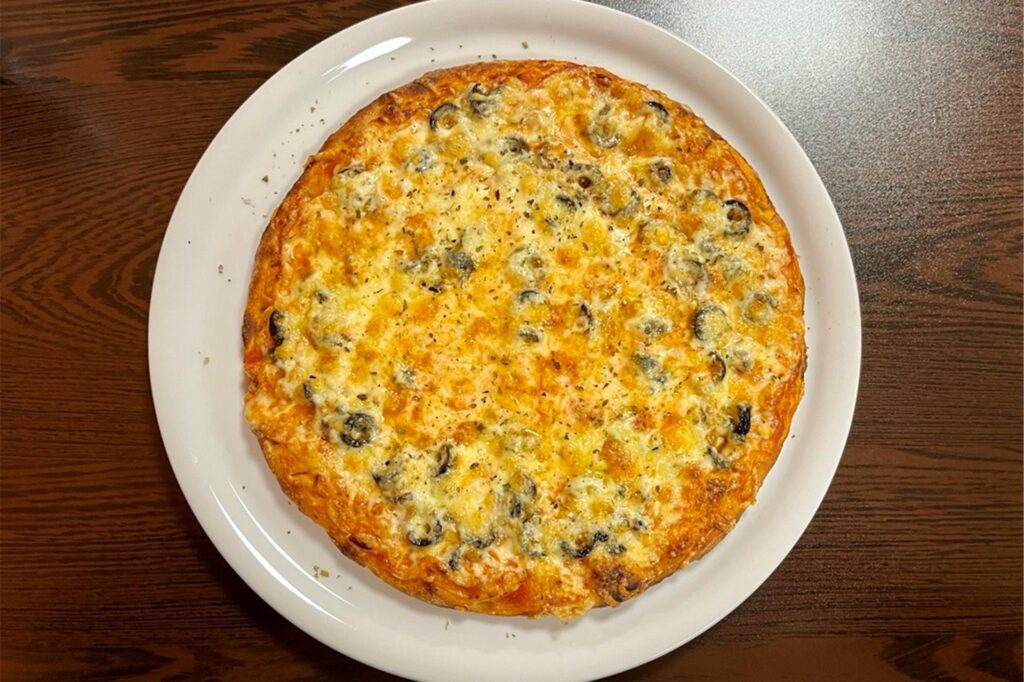 Pizza Napoli vom Restaurant Bella Asia in Dortmund Pizza Napoli vom Restaurant Bella Asia in Dortmund