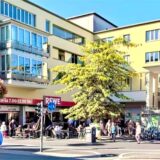 Die Bildkombi zeigt Marcus Engelhardt und den Eingang zum Rewe-Markt Bochumer Straße 138 in Recklinghausen.