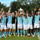 Die Spieler des ASC 09 bejubeln den Gewinn des Hecker-Cups 2024.