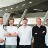 Die „Five Chefs“ Michael Dyllong, Attila Karpati, Daniel Östreich, Konstantin Kolombet und Sebastian Felsing stehen im Audi-Zentrum Dortmund.