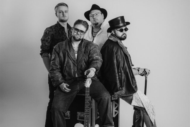 Ein Bandfoto in Schwarz-Weiß von BYOB.