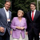 Gemeinsames Foto am 3. September 2012: Schauspieler Ralf Möller, Bundeskanzlerin Angela Merkel und Philipp Missfelder vor dem Ruhrfestspielhaus Recklinghausen, wo die Bundesdelegiertenversammlung der Senioren-Union stattfand.